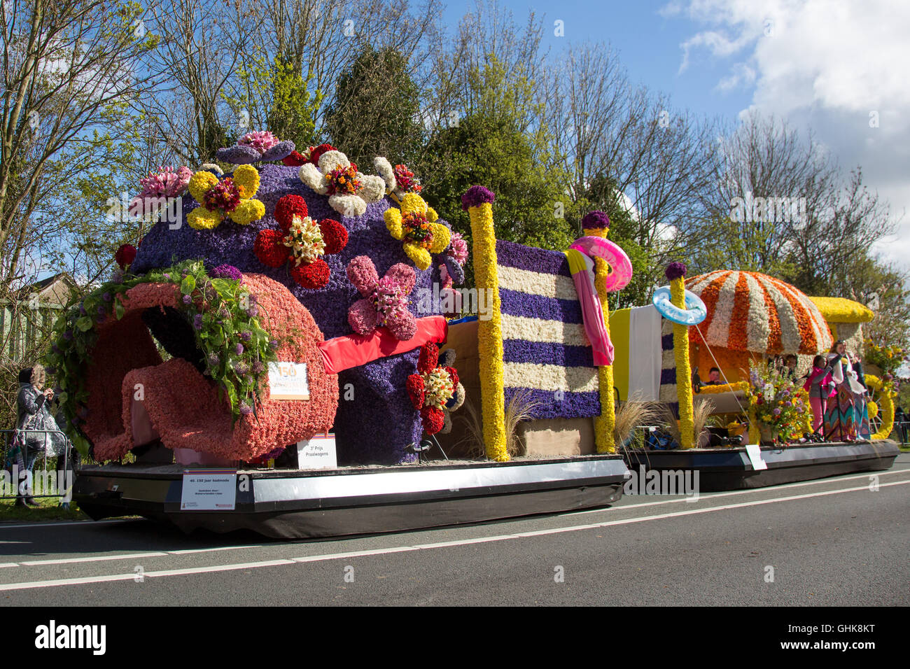 LISSE, NETHERLANDS - APRIL23,  2016: Platform theme Fashion and Flowers follows the route of the traditional flowers parade Stock Photo