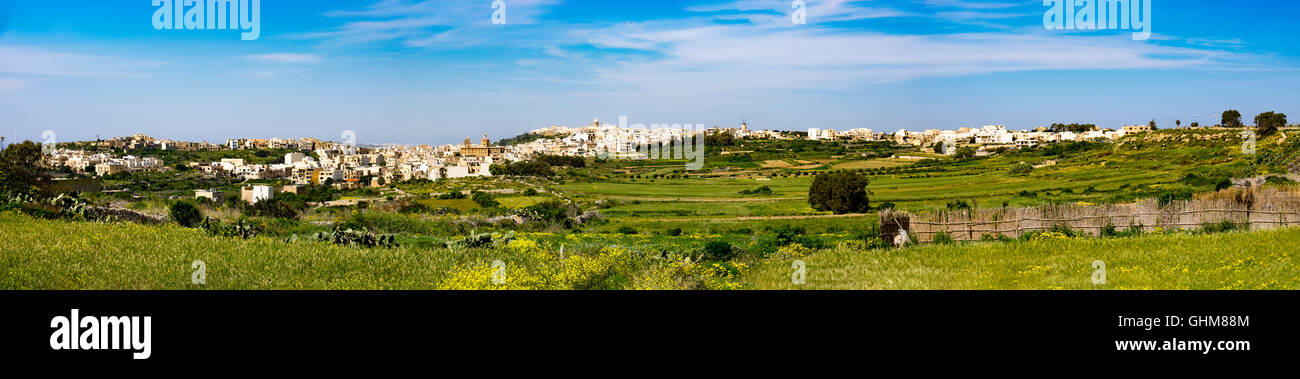 Panorama view of Mgarr city with green field. Gozo, Malta Stock Photo