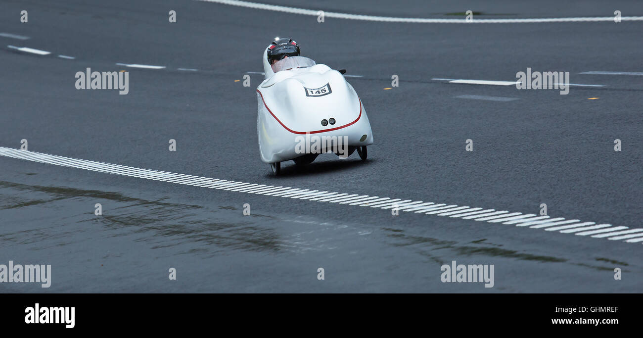 TROSA SWEDEN, May 17, 2015, biker on tour in a Velomobile. A man on a bike ride in an unusual vehicle. Stock Photo