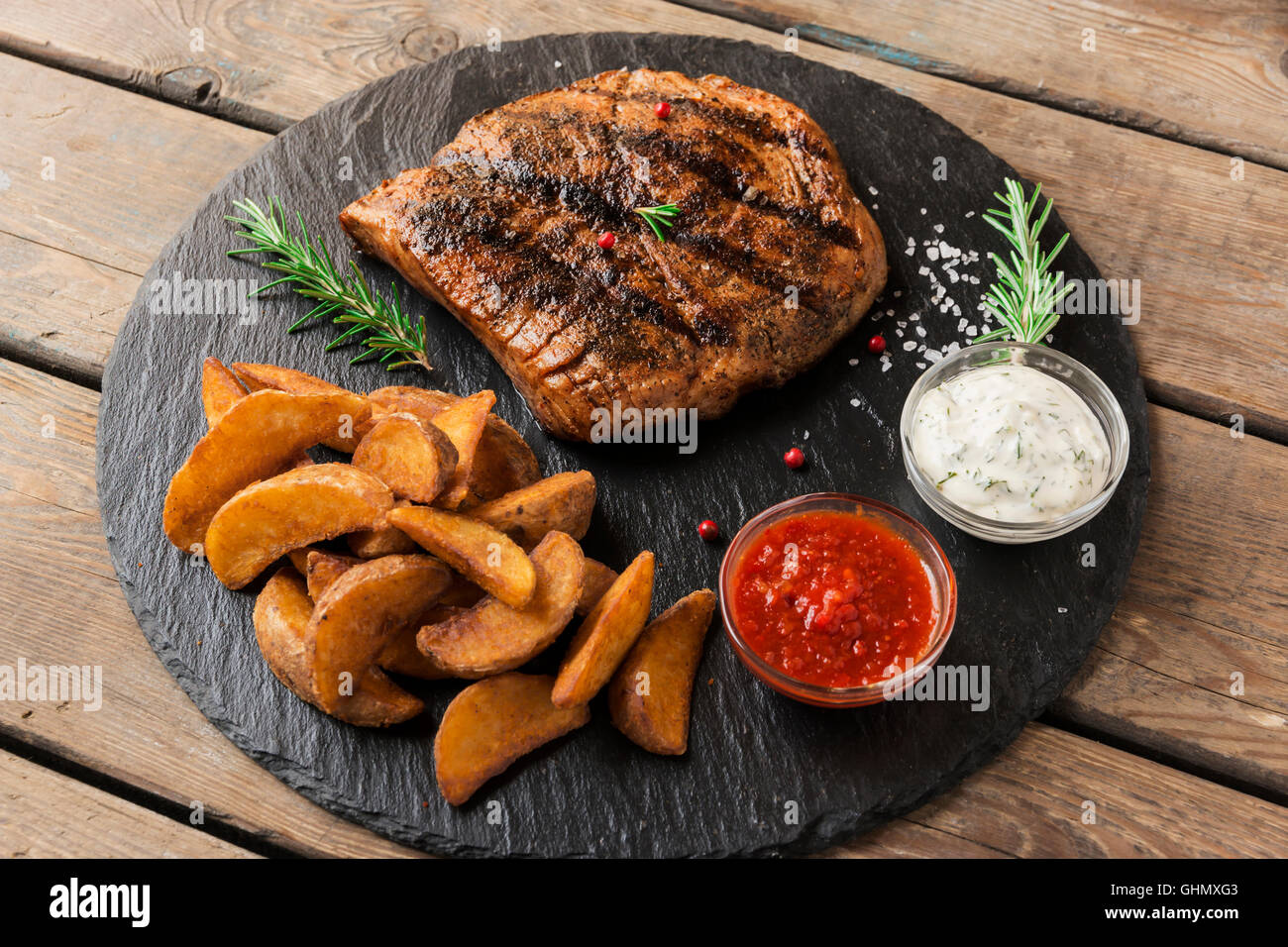 Grilled beef steak baked potato hi-res stock photography and images - Alamy
