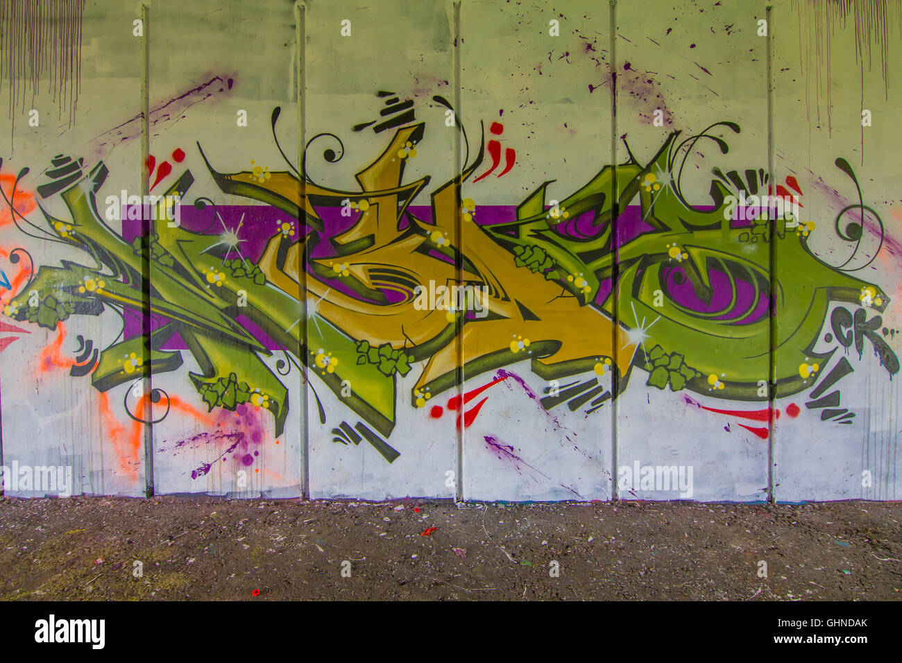 Vibrant Wild Style graffiti piece sprayed on concrete underpass Stock Photo