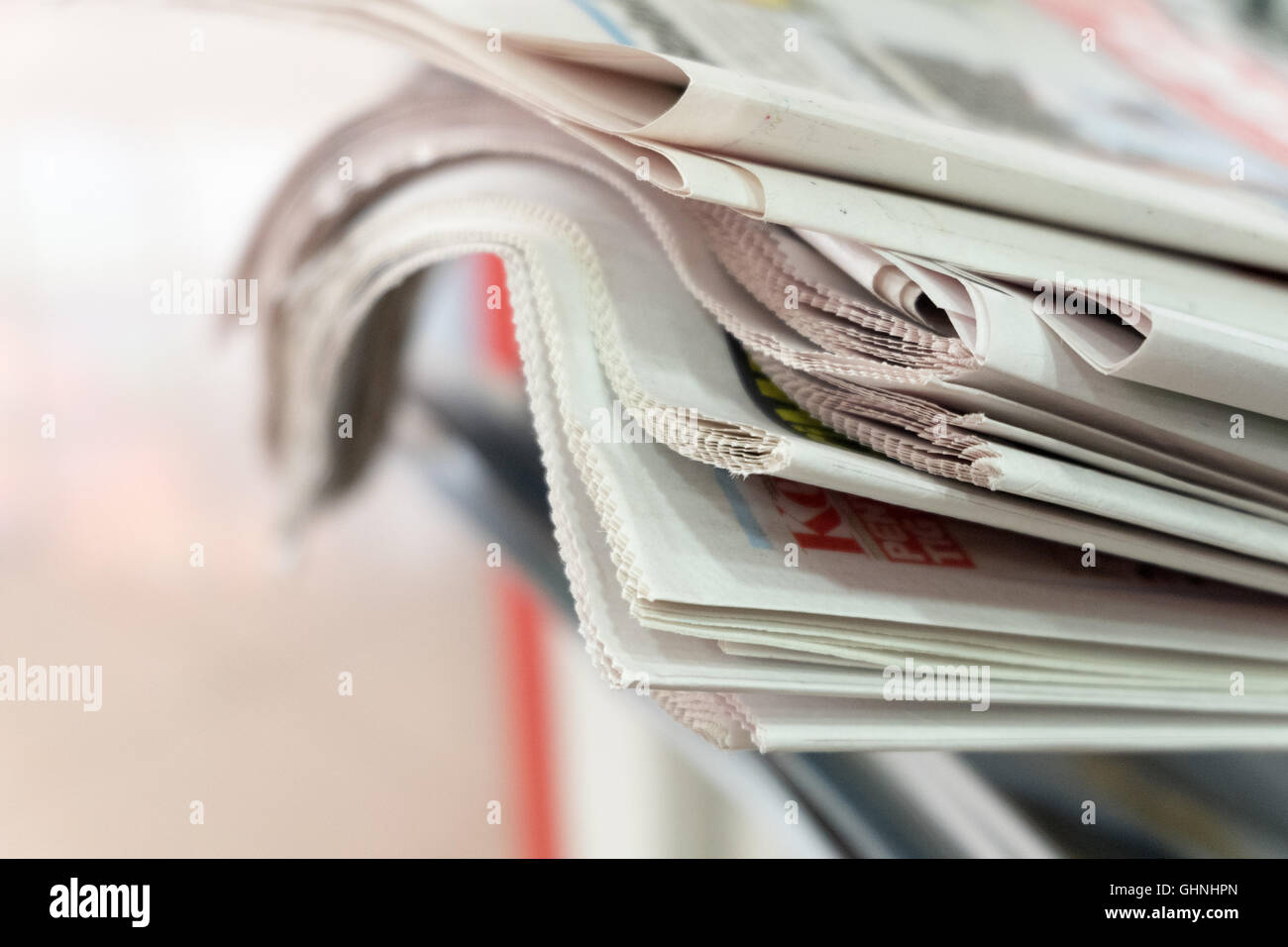 closeup business newspaper stacked in a row Stock Photo