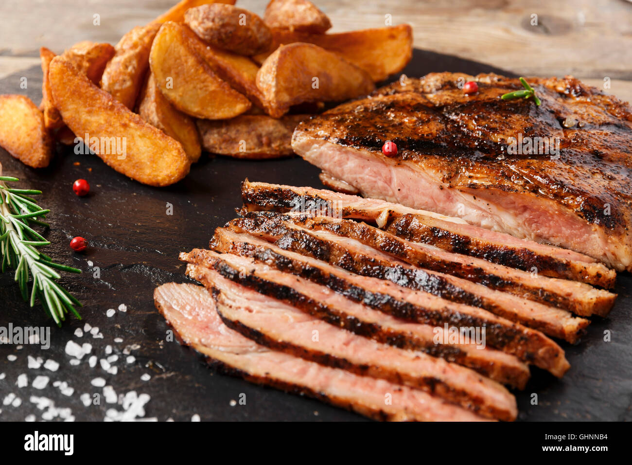 Grilled beef steak baked potato hi-res stock photography and images - Alamy