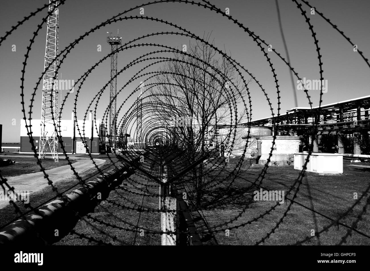 Barbed wires fence Black and White Stock Photos & Images - Alamy
