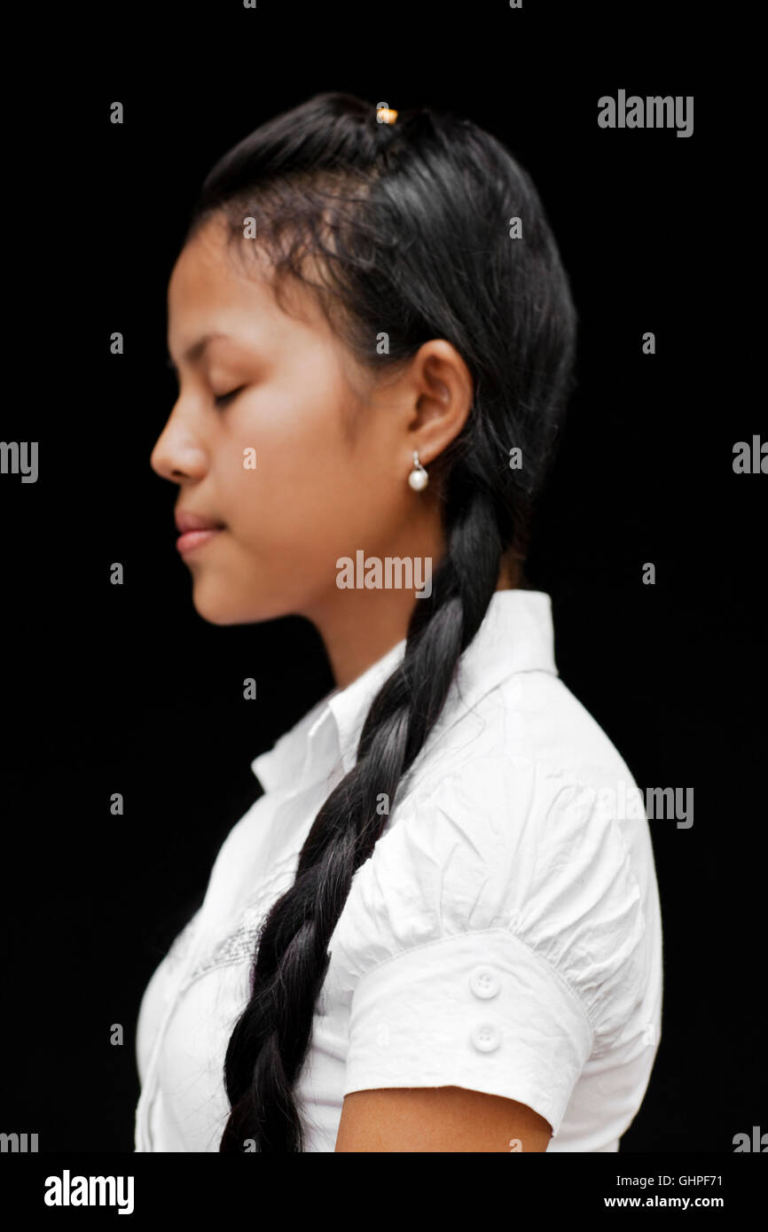 Portrait of Smot singer Srey Pov. Srey is a student and performer with Cambodia Living Arts in Phnom Pehn, Cambodia...Smot Chant Stock Photo