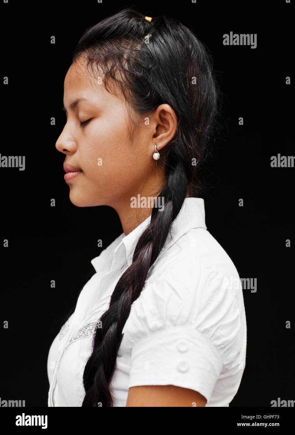 Portrait of Smot singer Srey Pov. Srey is a student and performer with Cambodia Living Arts in Phnom Pehn, Cambodia. Stock Photo