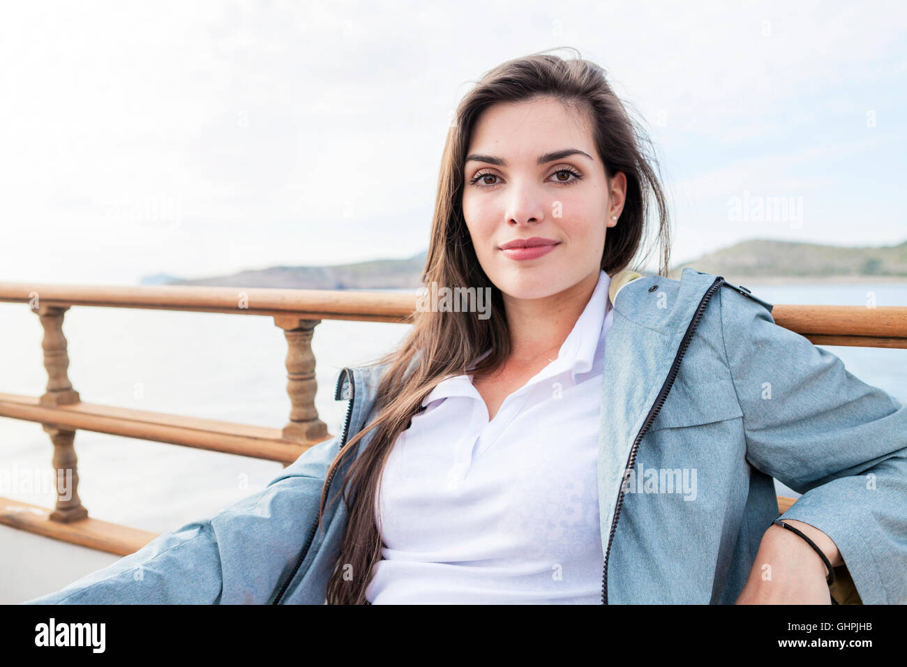 Portrait of beautiful woman on sailboat Stock Photo