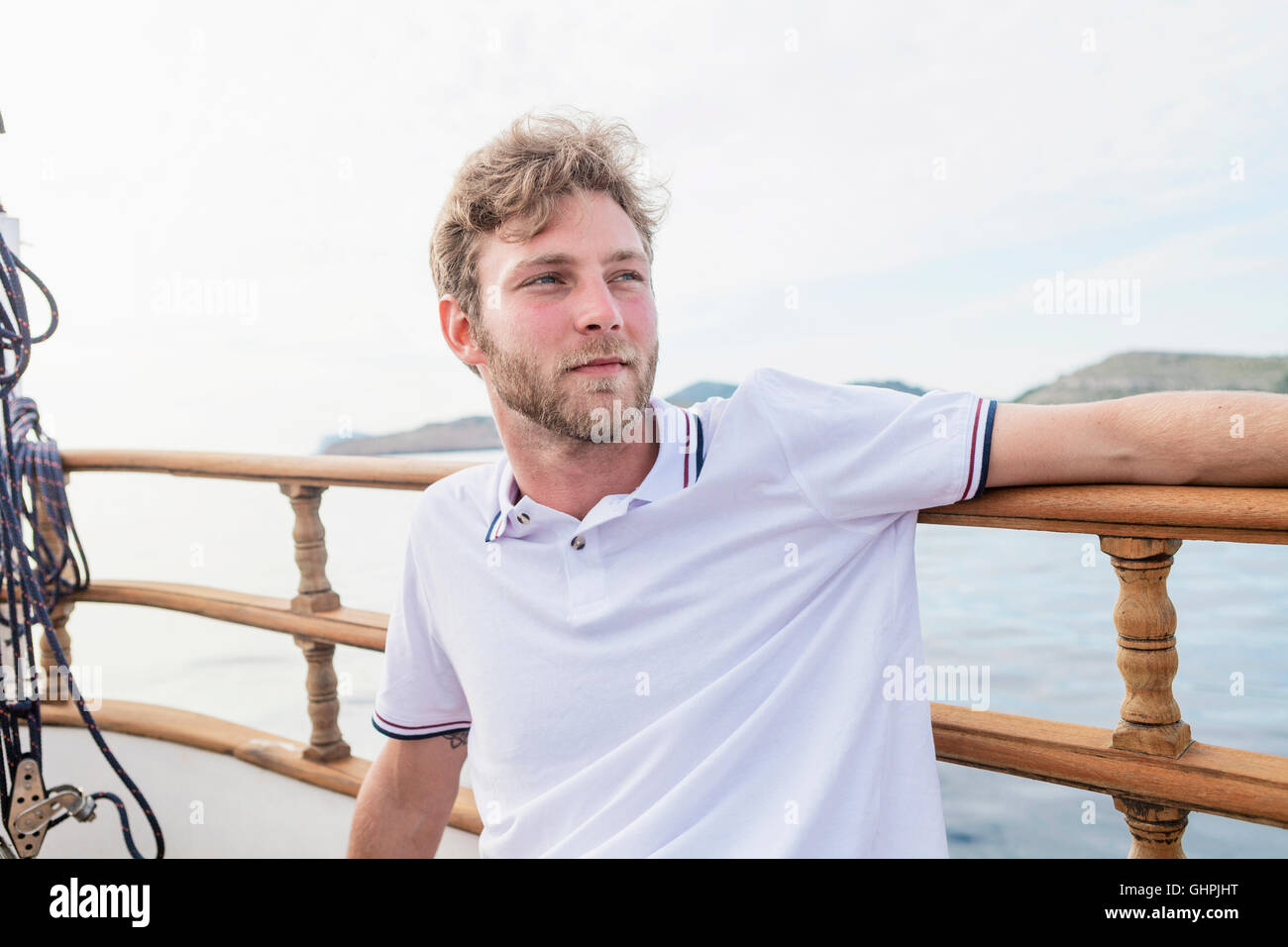 Portrait of man on sailboat Stock Photo