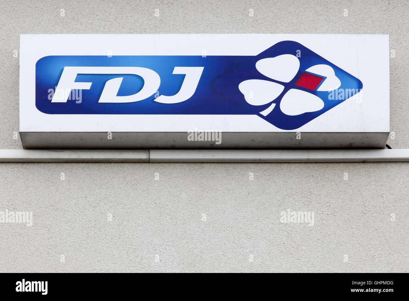 Francaise des Jeux also called FDJ logo on wall Stock Photo
