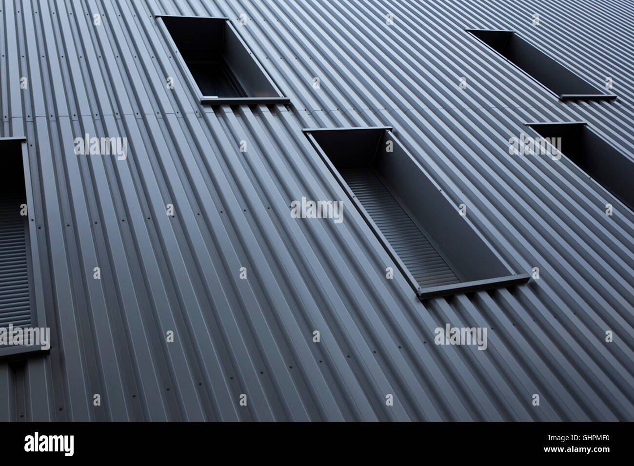 Close up of corrugated sheet on the facade of a modern building Stock