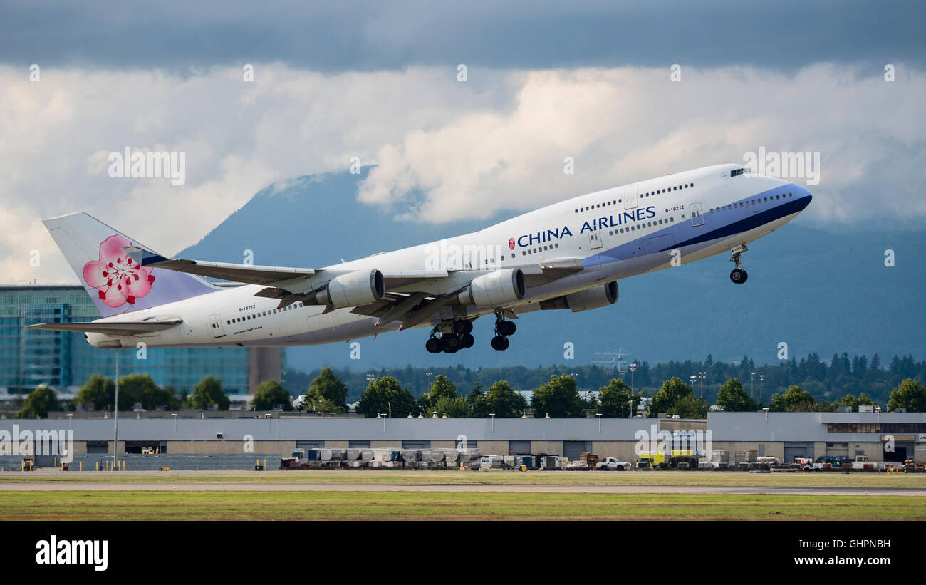 China Airlines plane Boeing 747 wide-body jet airliner airplane aeroplane taking off air travel flying Stock Photo