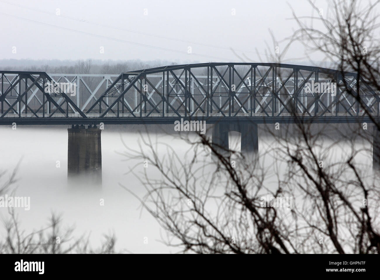 Mississippi River Bridge in fog Stock Photo