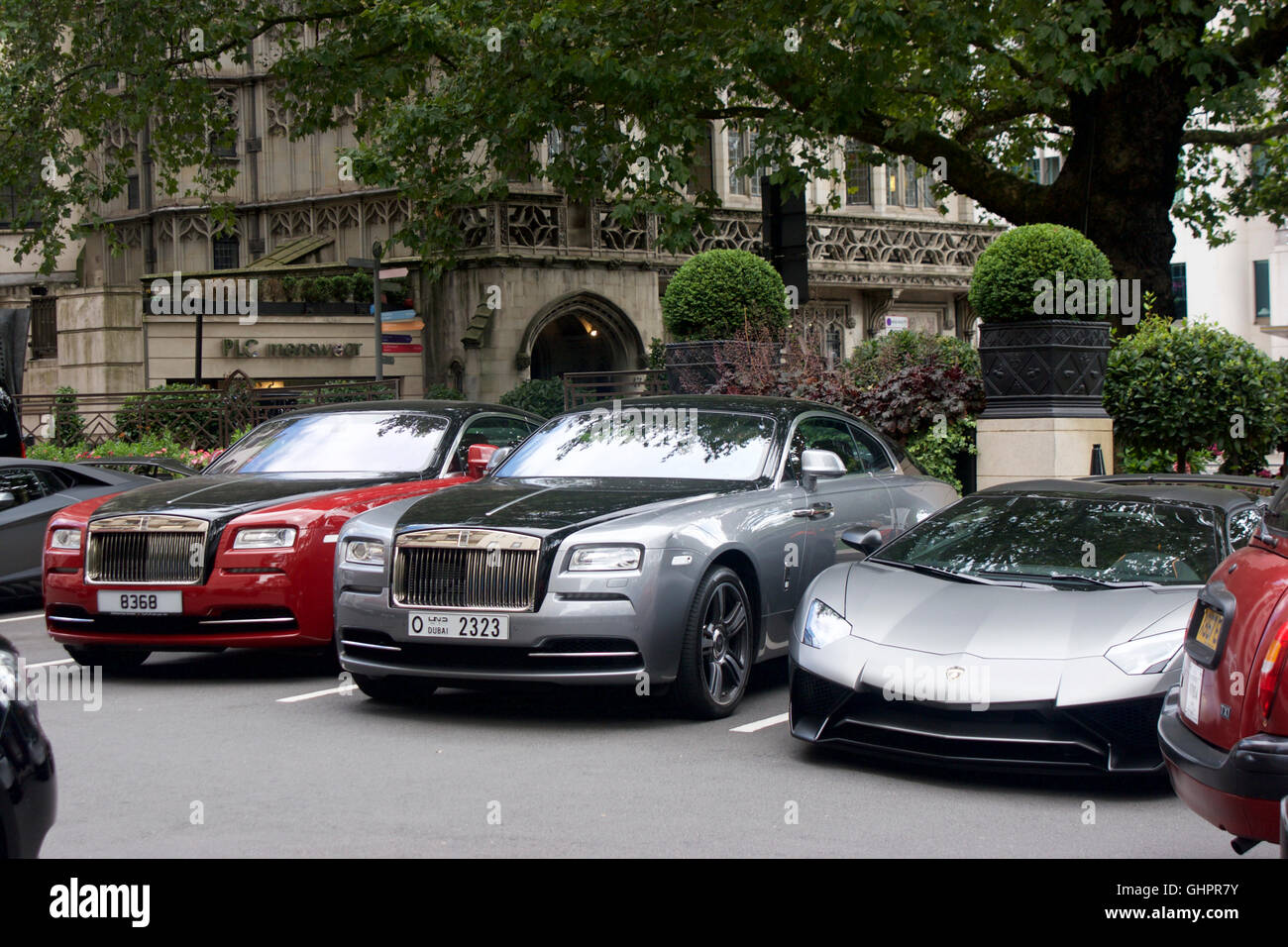 Luxury cars parked outside Dorchester hotel in London Stock Photo