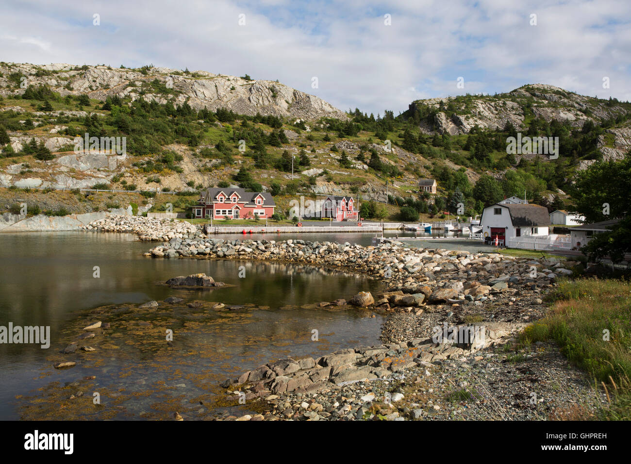 Waterfront houses at Brigus in Newfoundland and Labrador, Canada. The buildings overlook Conception Bay. Stock Photo