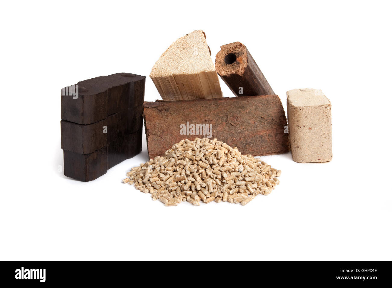 different sorts of fossil fuels, wooden pellets, briquettes, dried firewood, and carbon on white background, isolated, Stock Photo