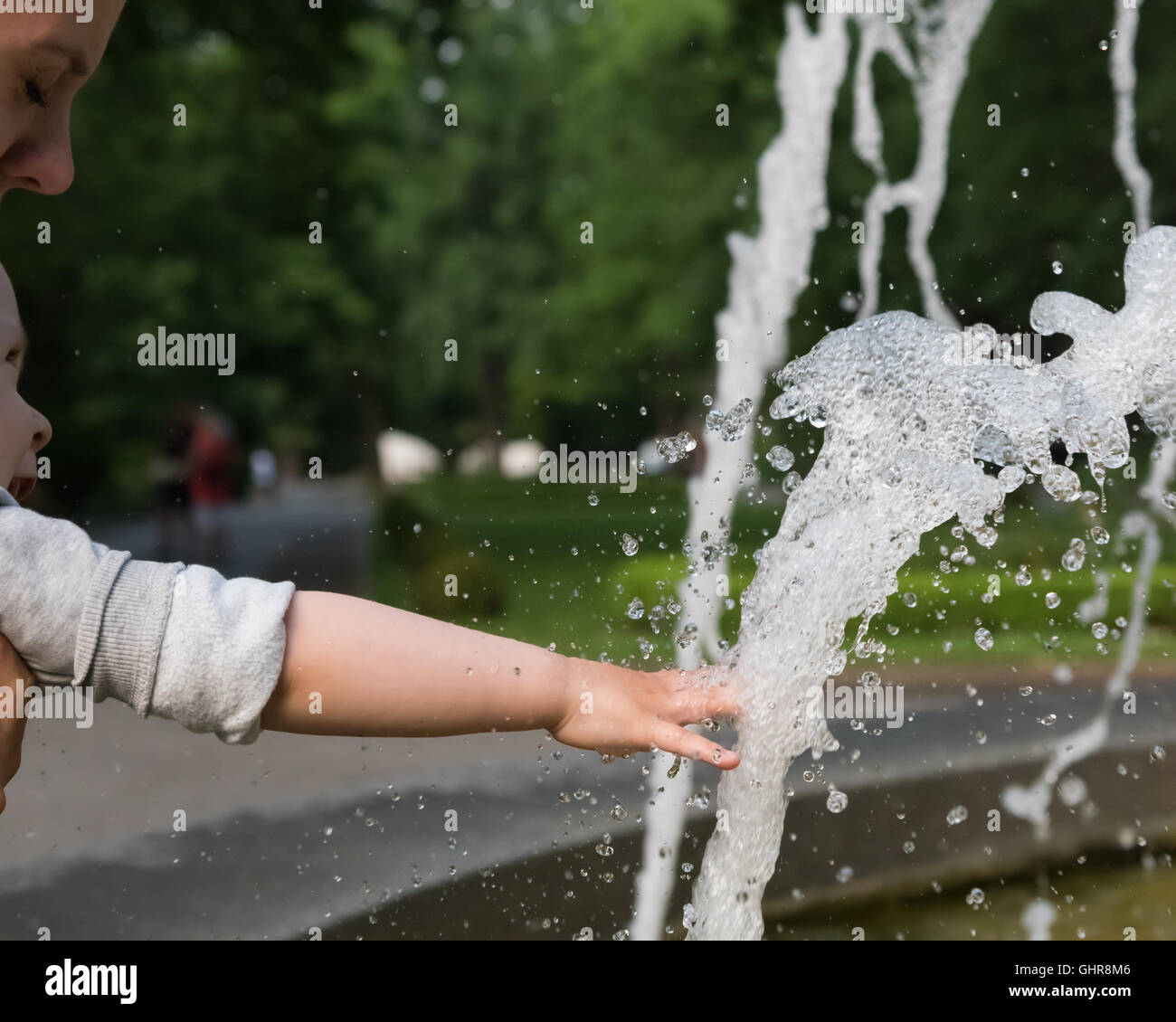 beautiful fountain with a child Stock Photo