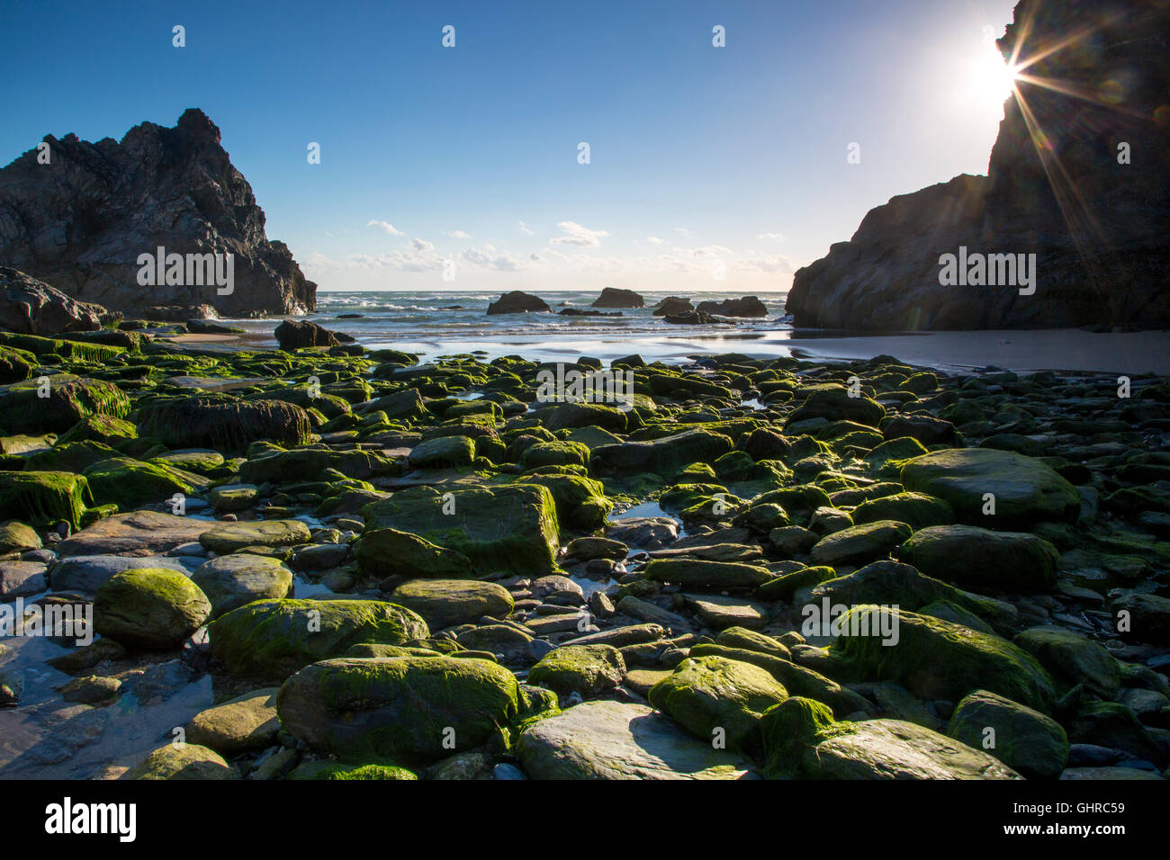 Sea stacks and rocky beach at the Bedruthan Steps along the coast of Cornwall, England Stock Photo