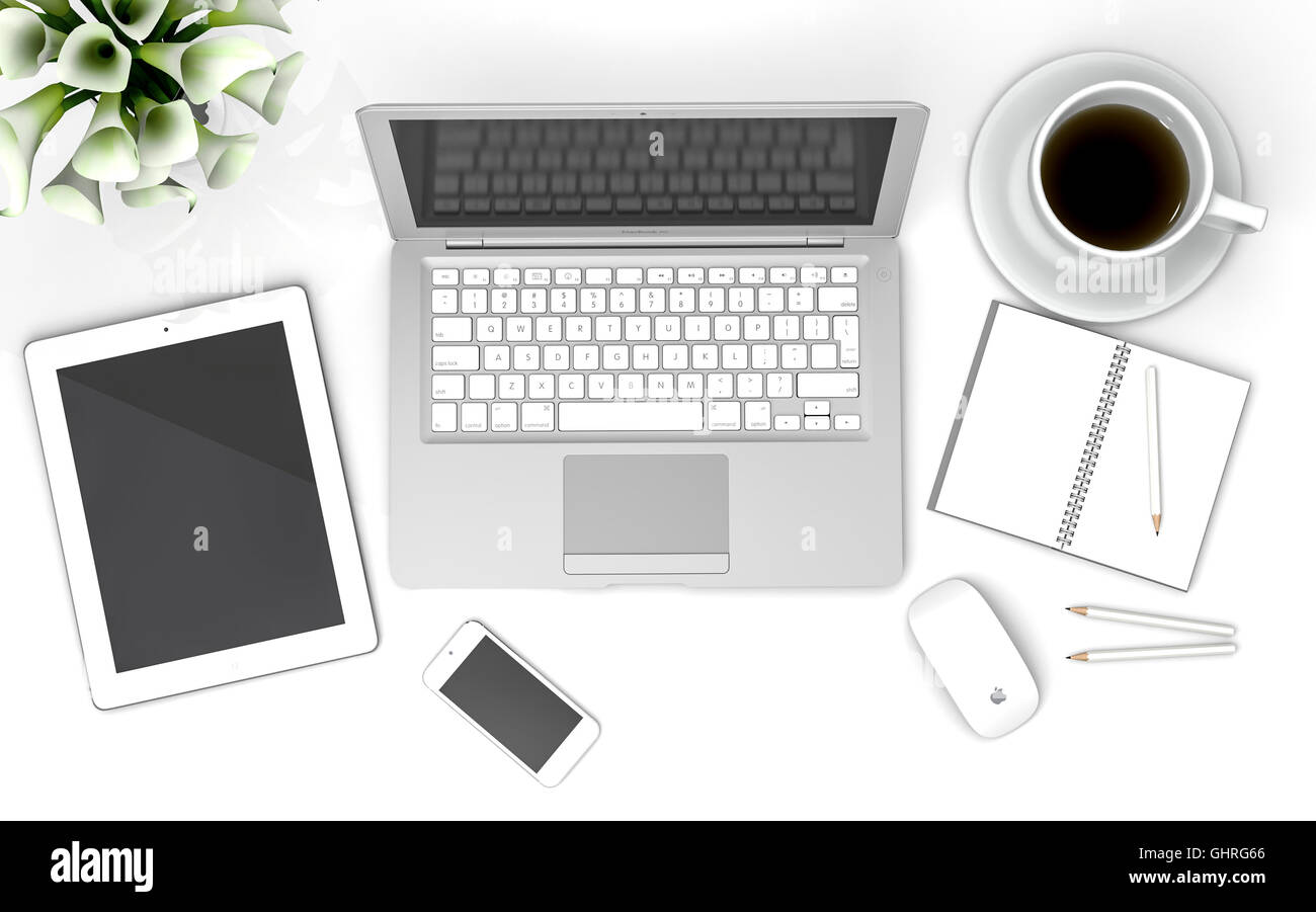 Ipad Iphone 5 Macbook Air And Apple Magic Mouse On A Desk With A Cup Of Coffee Lilys And A Note Book And Pencils Stock Photo Alamy