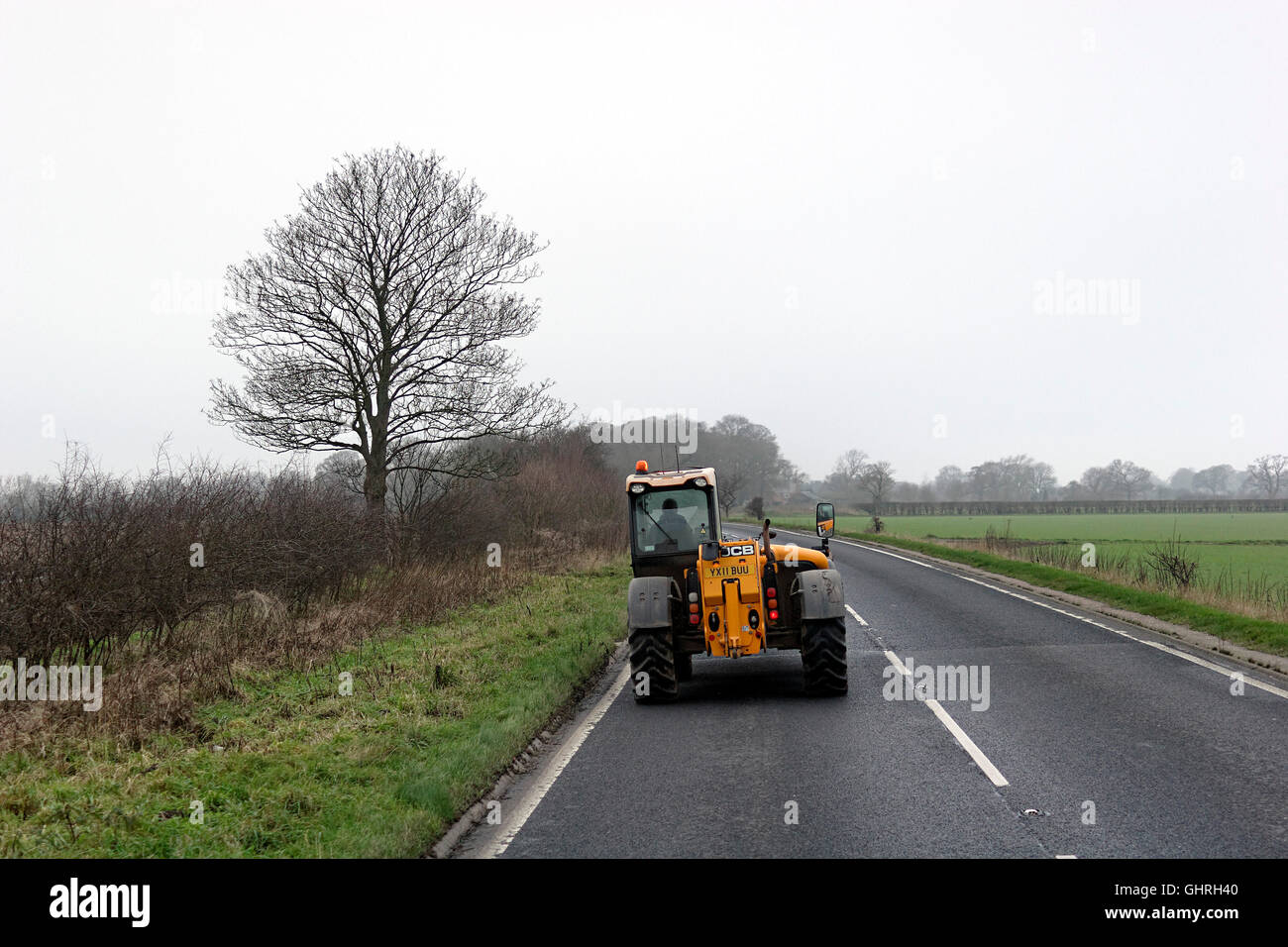 Slow moving vehicle on single carriageway road,Yorkshire,England,UK