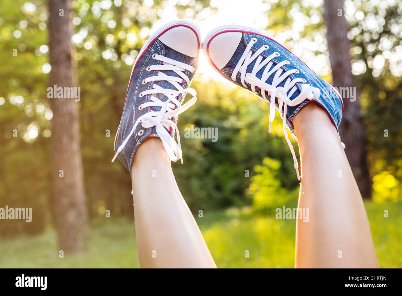 Girl wearing sneakers High Resolution Stock Photography and Images Alamy