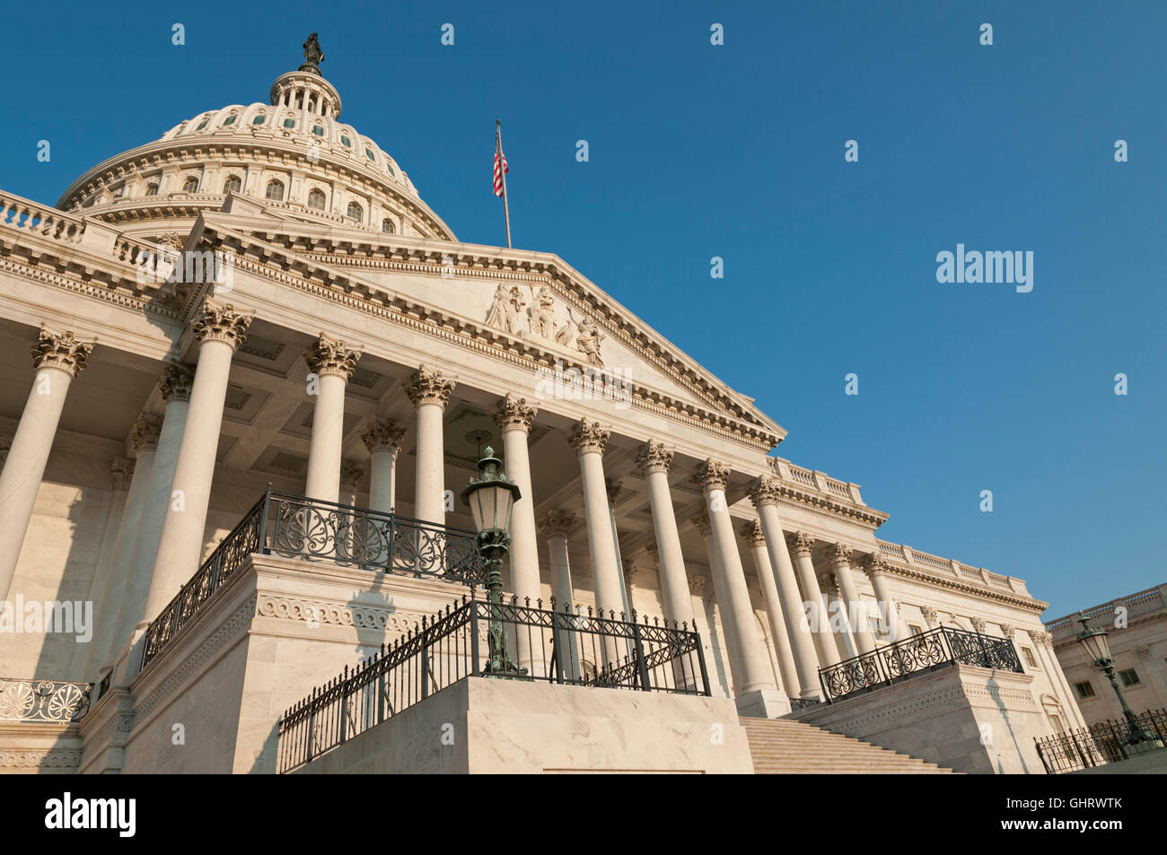 The eastern facade of the US Capitol Building, shortly after dawn. Stock Photo