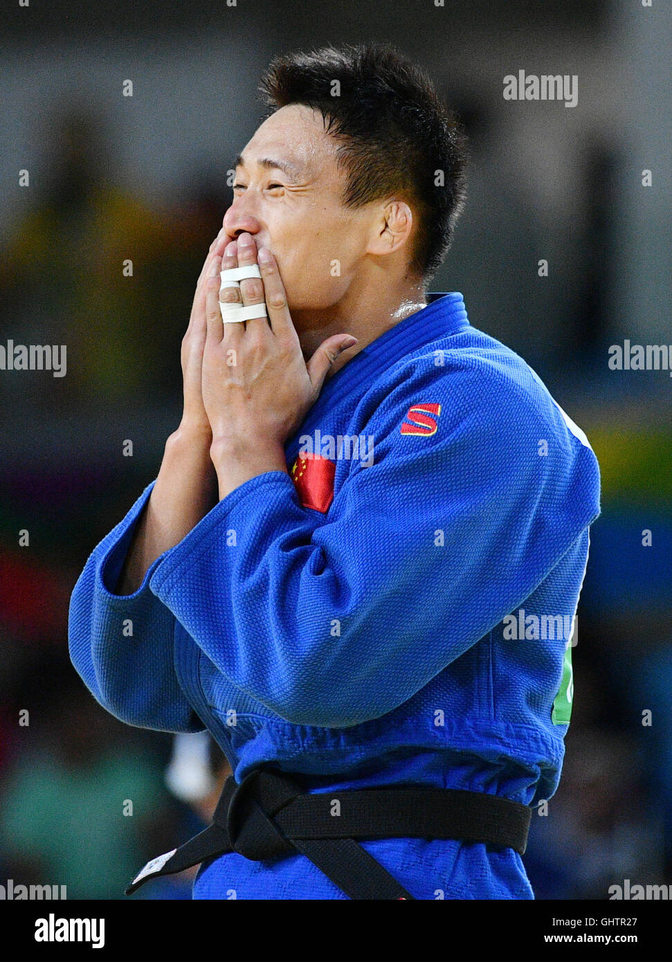 Rio de Janeiro, Brazil. 10th Aug, 2016. Xunzhao Cheng of China celebrates during his fight against O Lkhagvasuren of Mongolia during the Men -90 kg Bronze medal contest of the Judo event during the Olympic Games at Carioca Arena 2 in Rio de Janeiro, Brazil, 10 August 2016. Cheng won the Bronze medal. Photo: Lukas Schulze/dpa/Alamy Live News Stock Photo