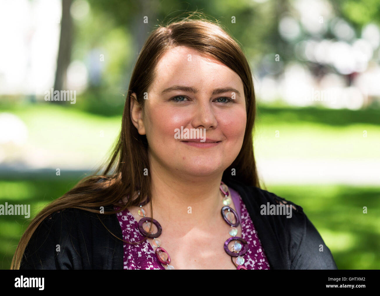 Vienna, Austria. 3rd Aug, 2016. Natascha Kampusch, who was held captive and abused for years, pictured during a dpa interview in the Burggarten park in Vienna, Austria, 3 August 2016. The 28-year-old is set to publish her new book Natascha Kampusch: 10 Jahre Freiheit' (lit. Natascha Kampusch: 10 years of freedom). PHOTO: PETER TRYKAR/DPA/Alamy Live News Stock Photo
