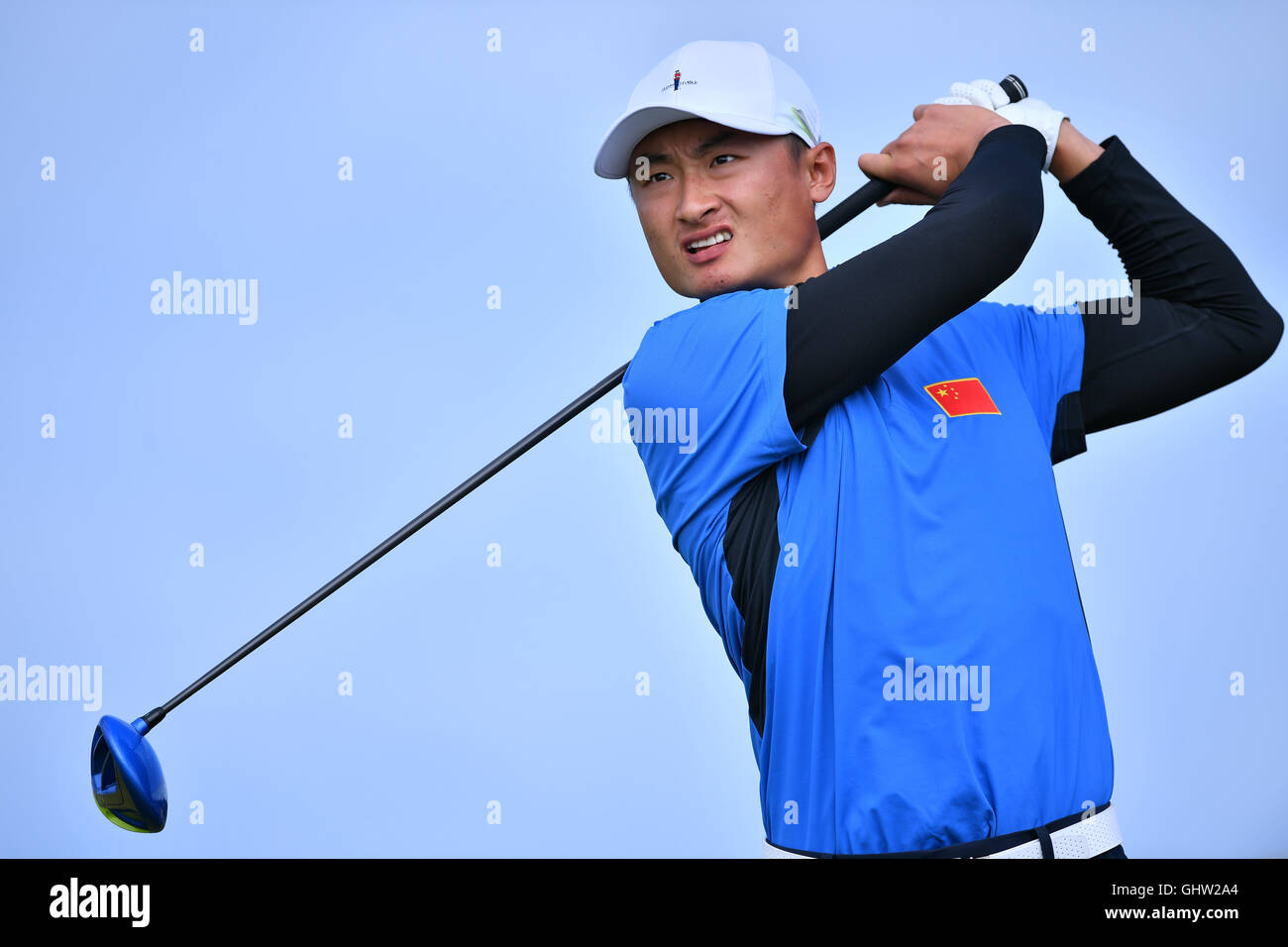 Rio de Janeiro, Brazil. 11th Aug, 2016. Haotong Li of China in action during the Men's Individual Stroke Play Round 1 of the Golf events during the Olympic Games at the Olympic Golf Course in Rio de Janeiro, Brazil, 11 August 2016. Photo: Lukas Schulze/dpa/Alamy Live News Stock Photo