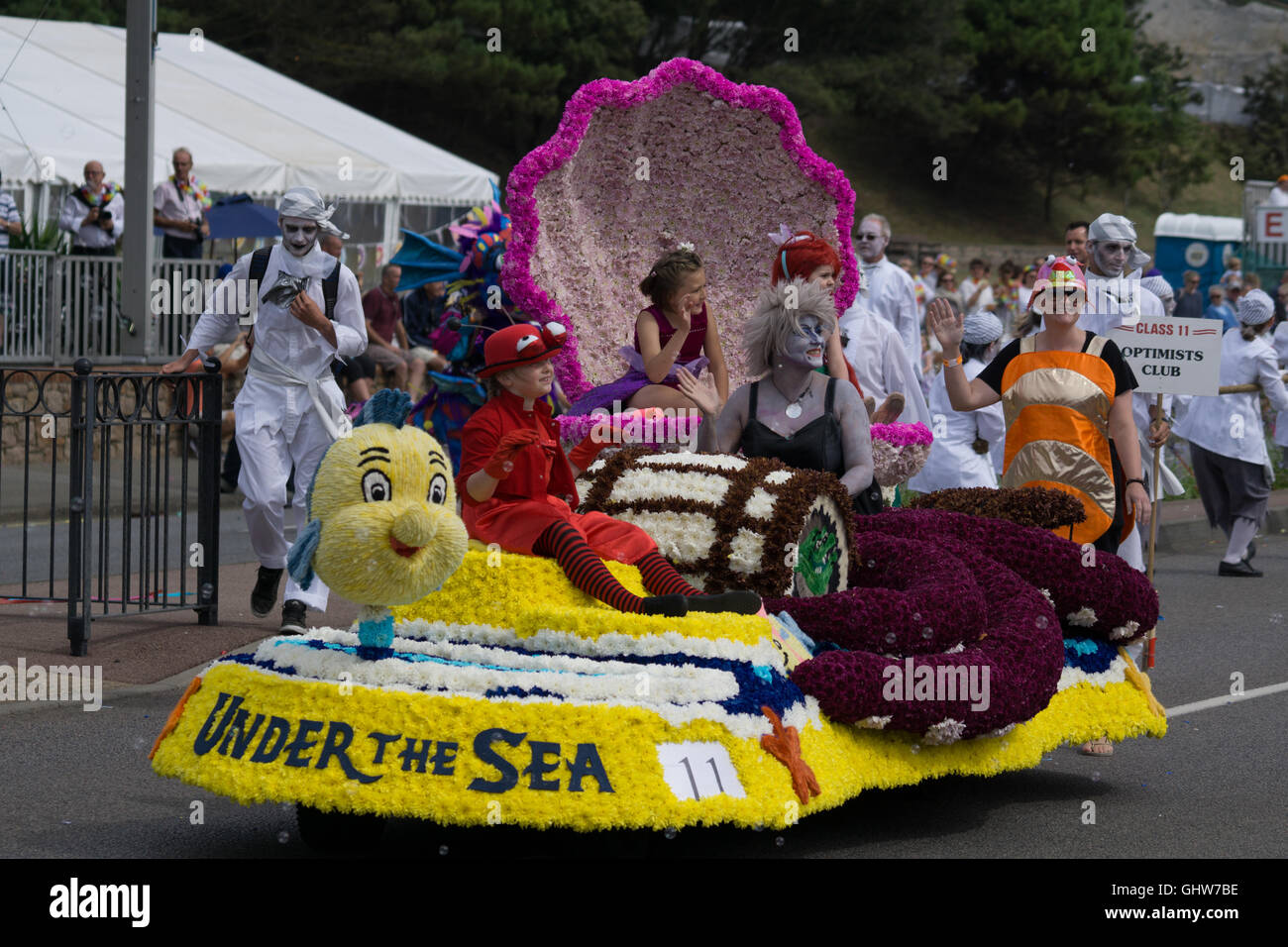 Jersey, Channel Islands, UK. 11th August, 2016. A participant float and  contingent along the parade route of the Jersey Battle of Flowers 2016  Credit: imagegallery2/Alamy Live News Stock Photo - Alamy