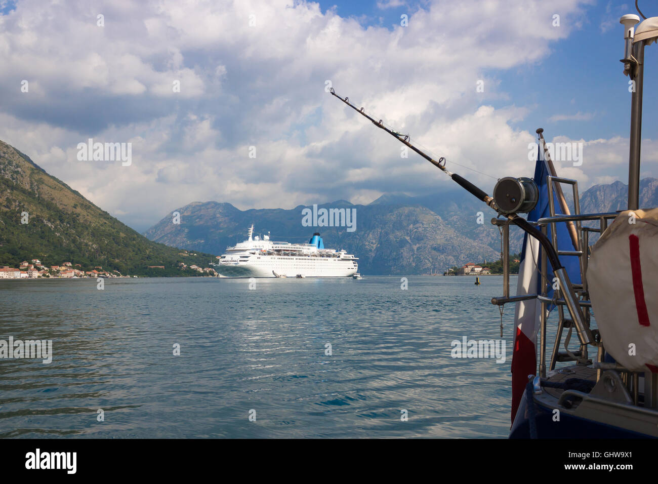 fishing rod and cruise ship Stock Photo