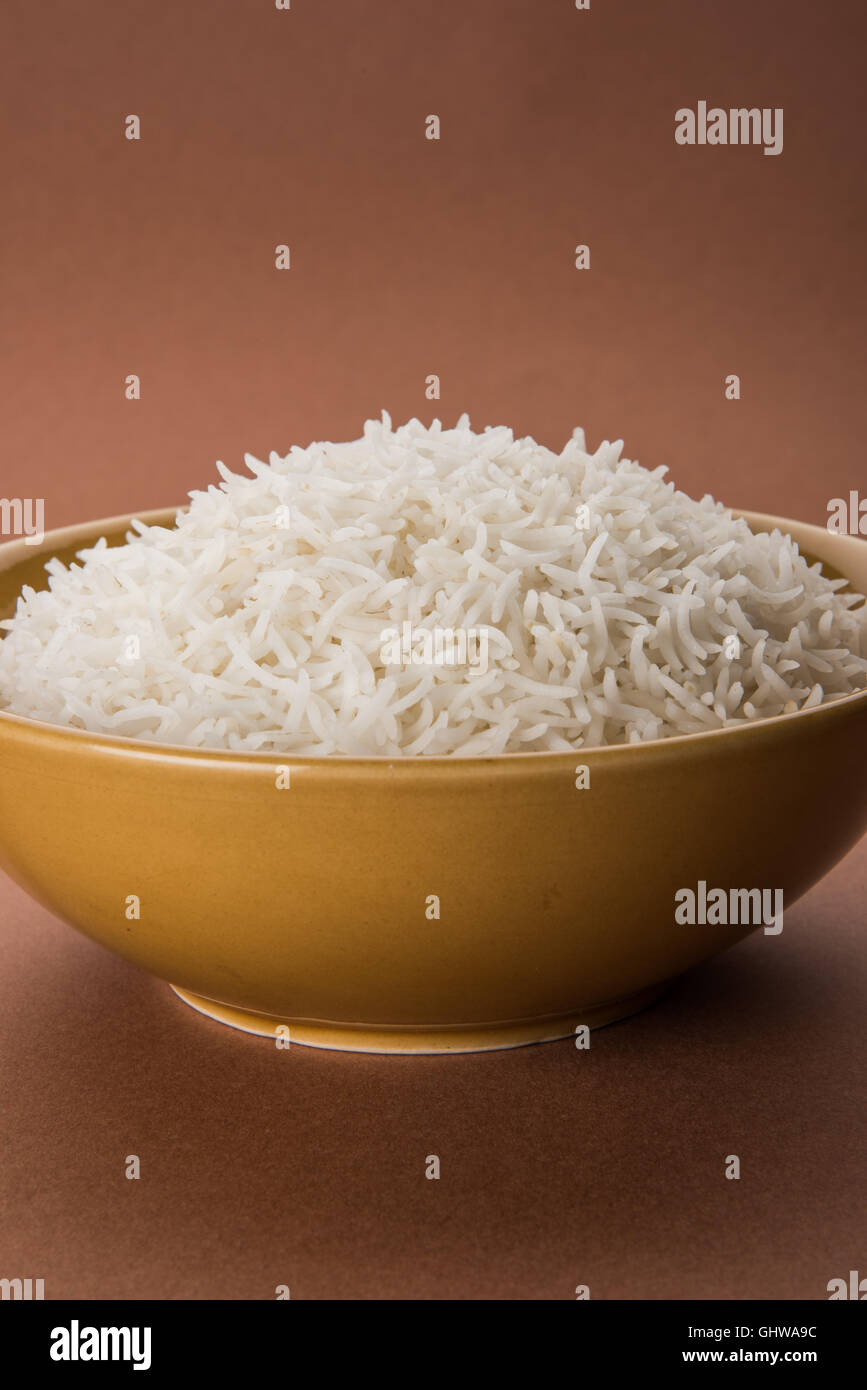 basmati rice in a brass bowl, cooked basmati rice, cooked plain rice