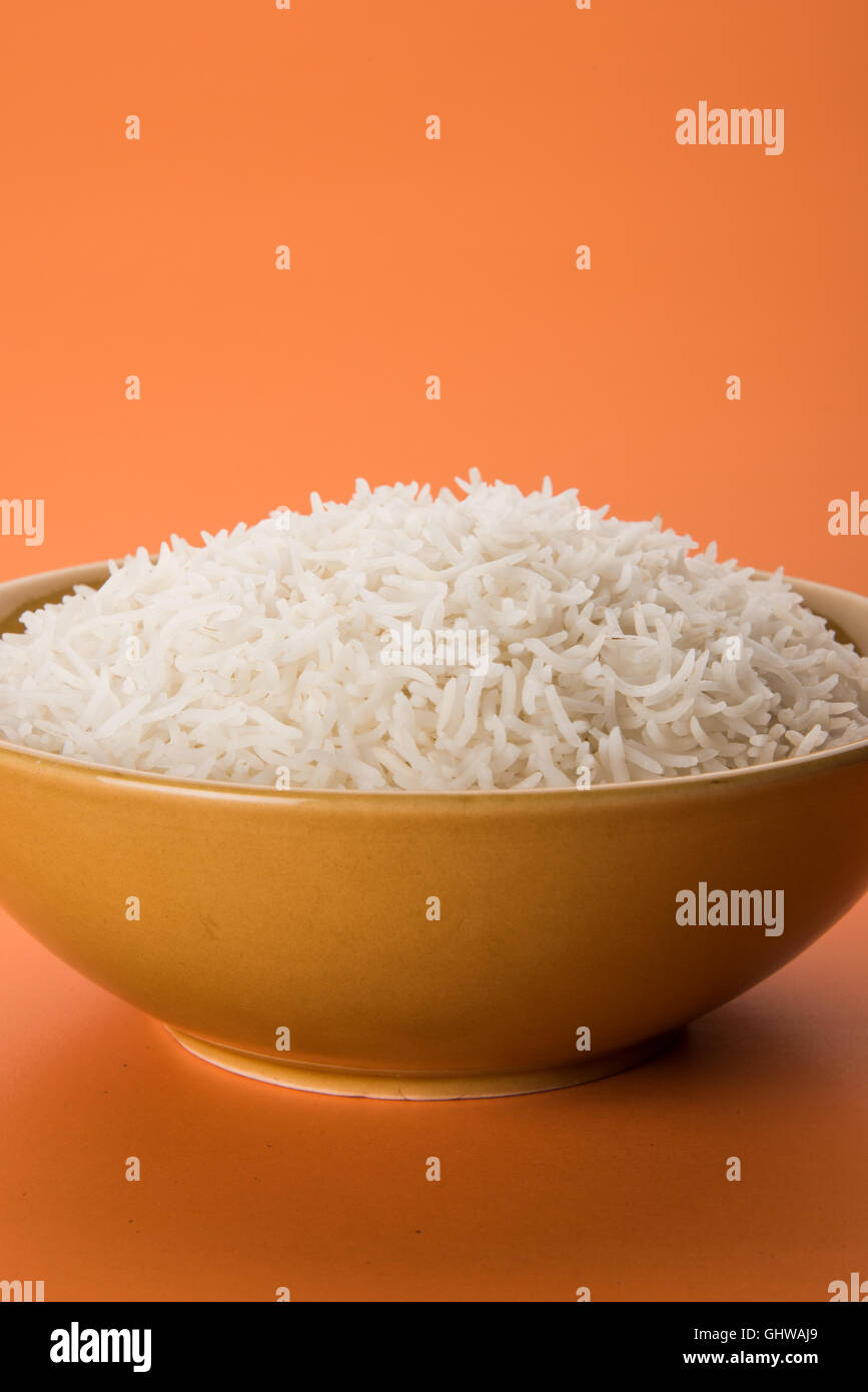 basmati rice in a brass bowl, cooked basmati rice, cooked plain rice