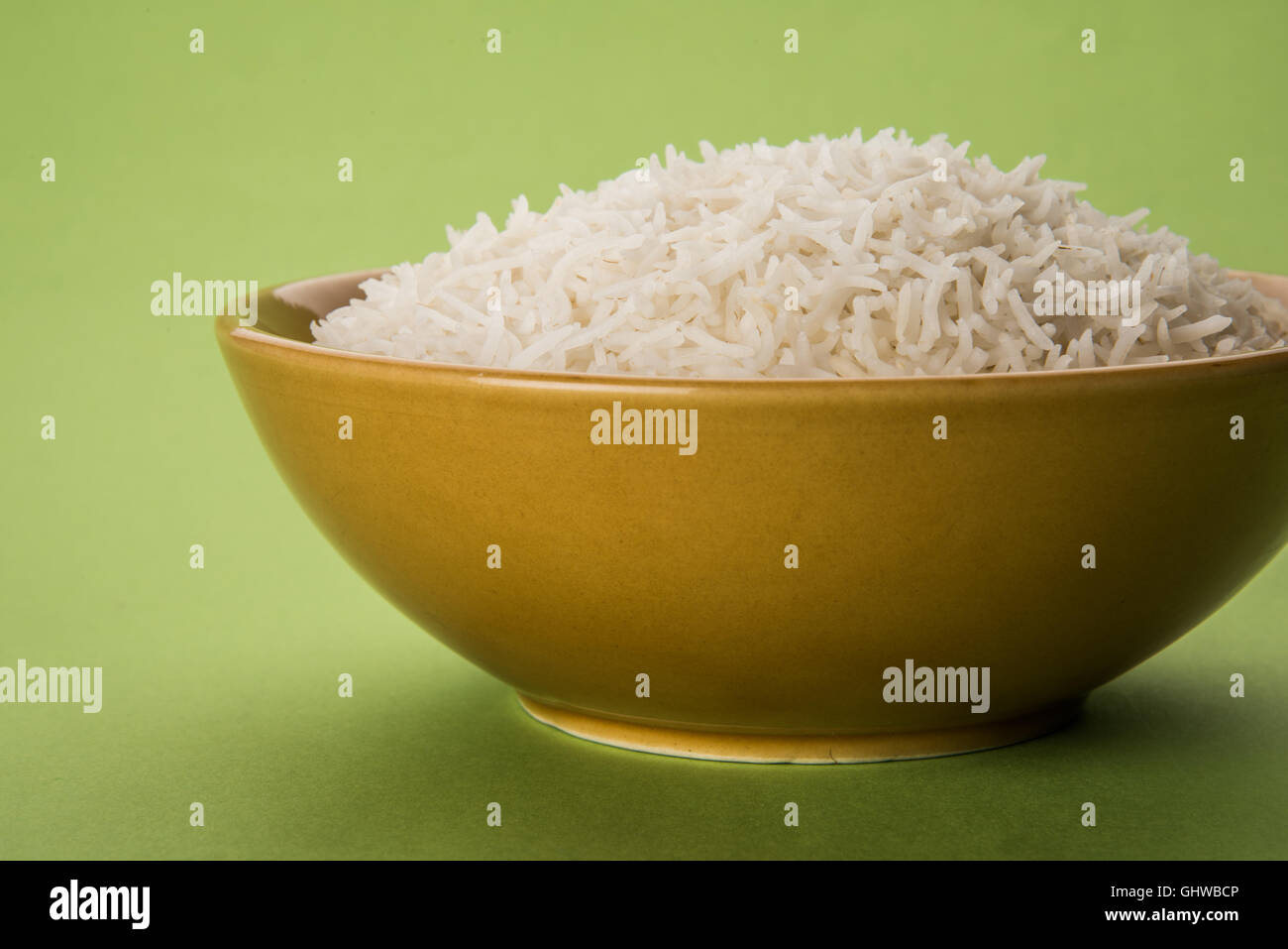 basmati rice in a brass bowl, cooked basmati rice, cooked plain rice