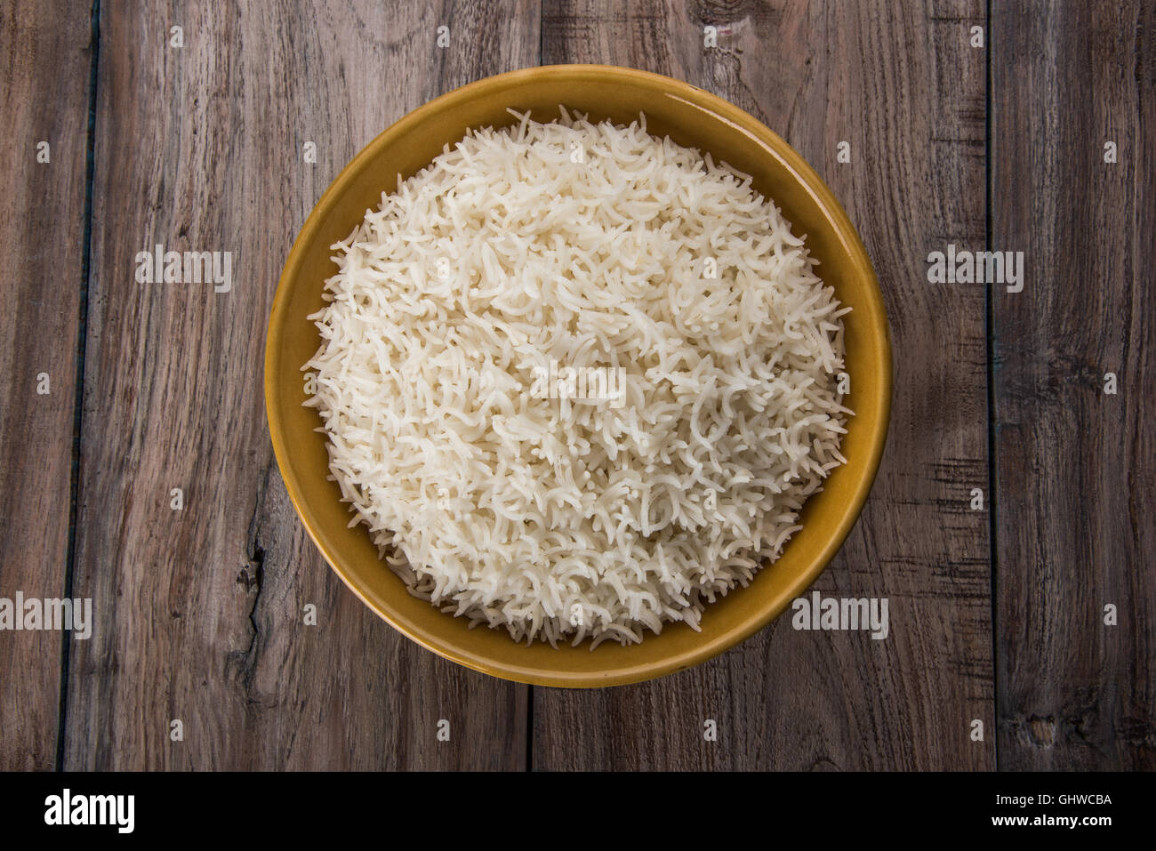 basmati rice in a brass bowl, cooked basmati rice, cooked plain rice