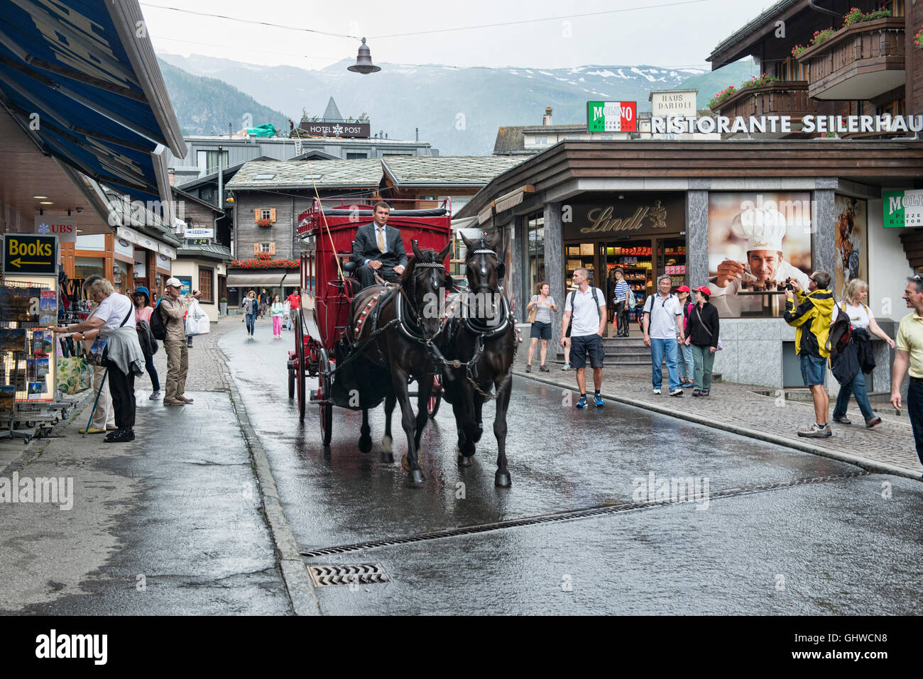 Horse and carriage on a rainy day, Zermatt, Switzerland Stock Photo - Alamy