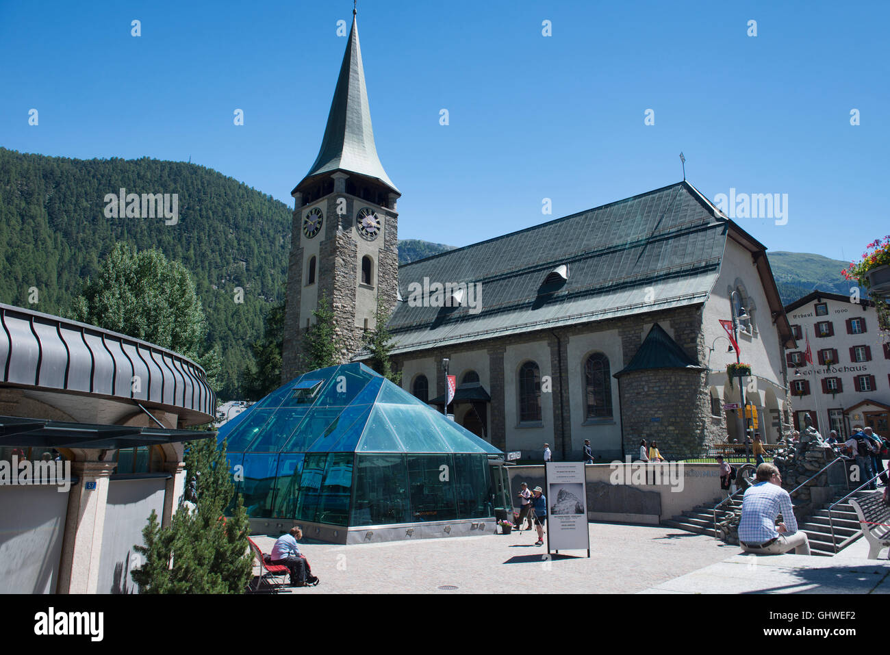 The Matterhorn Museum and church in the center of Zermatt, Switzerland Stock Photo