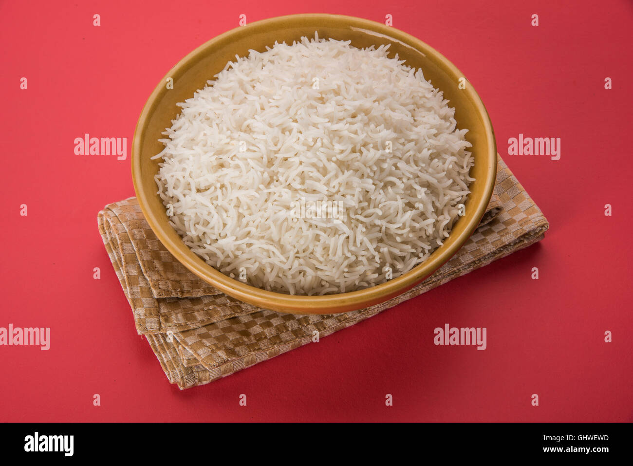 basmati rice in a brass bowl, cooked basmati rice, cooked plain rice, cooked white basmati rice