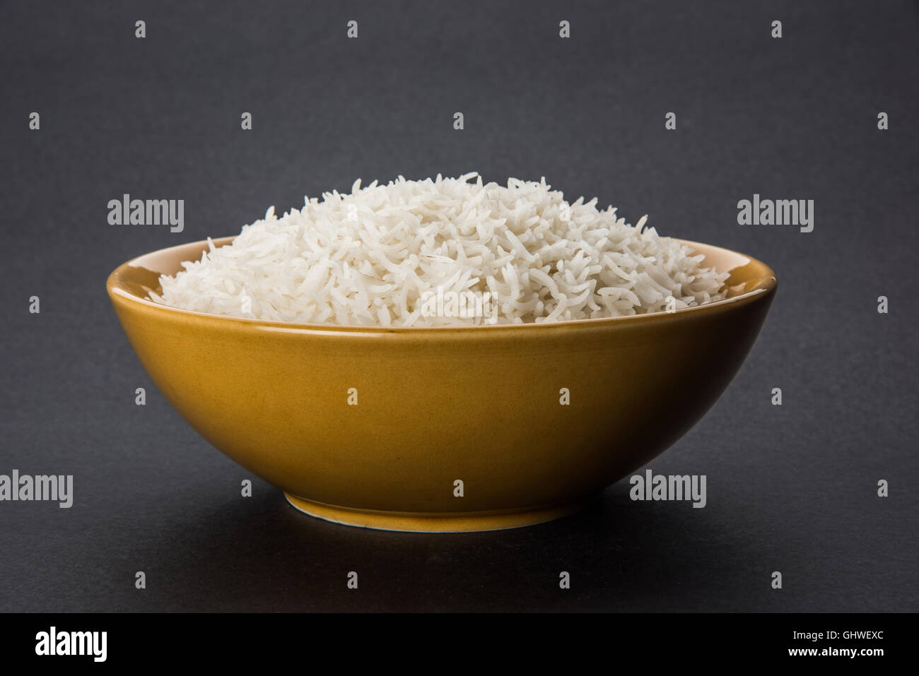 basmati rice in a brass bowl, cooked basmati rice, cooked plain rice, cooked white basmati rice