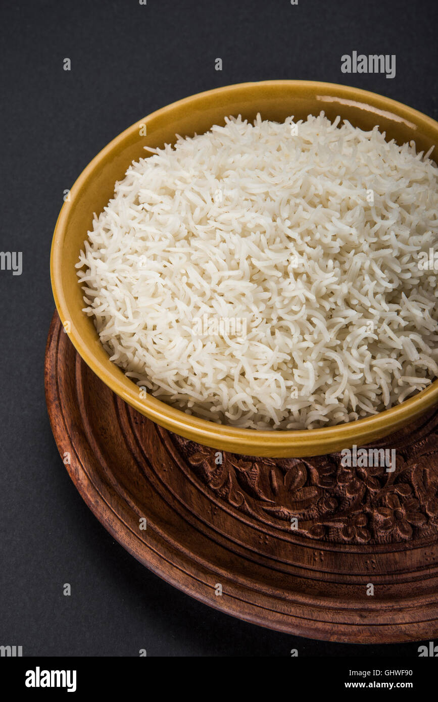 basmati rice in a brass bowl, cooked basmati rice, cooked plain rice