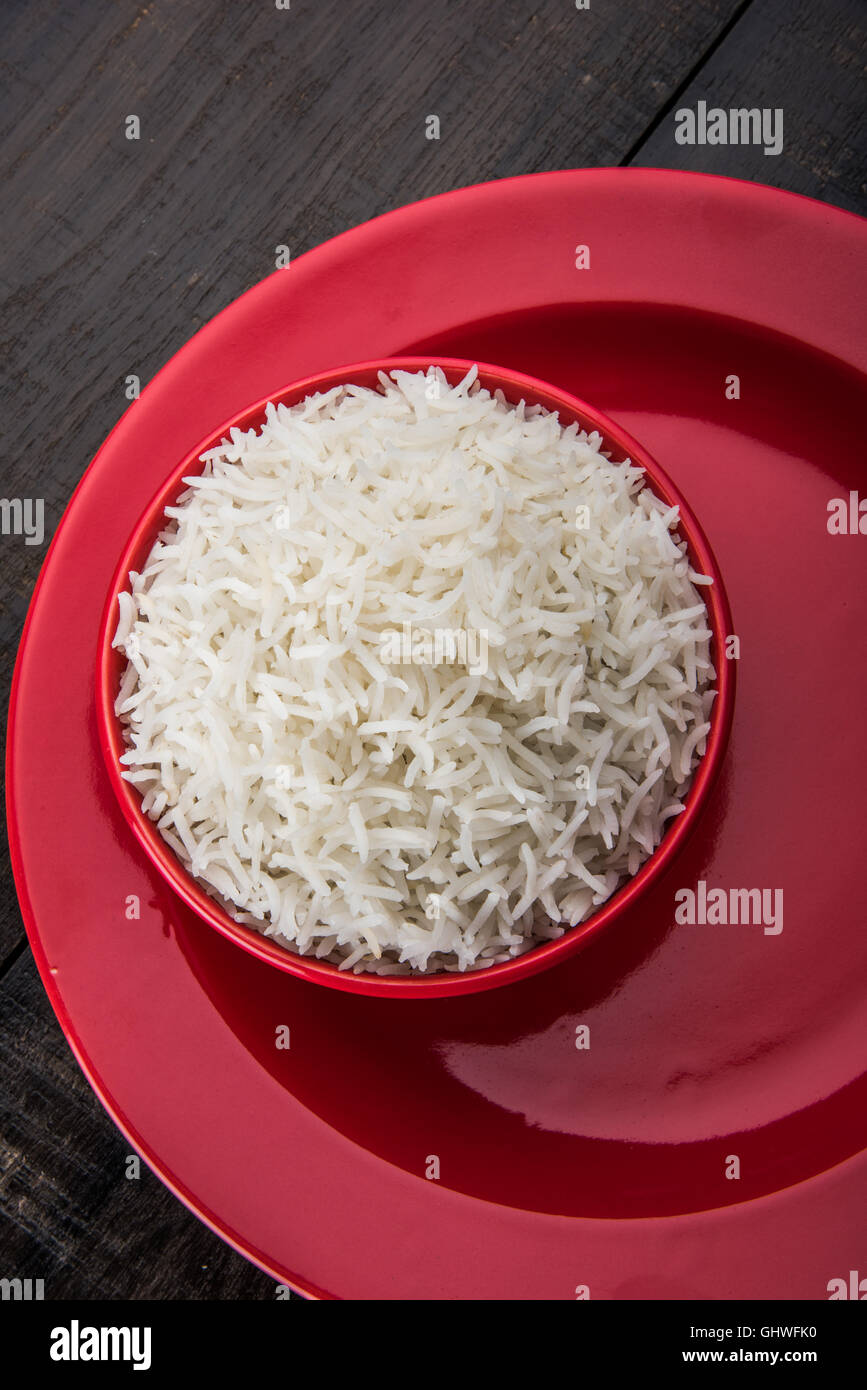 basmati rice in a brass bowl, cooked basmati rice, cooked plain rice