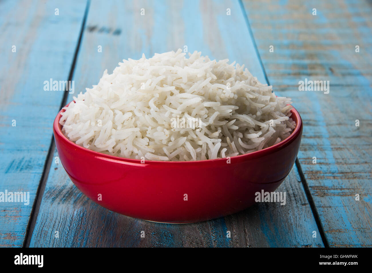 basmati rice in a brass bowl, cooked basmati rice, cooked plain rice, cooked white basmati rice