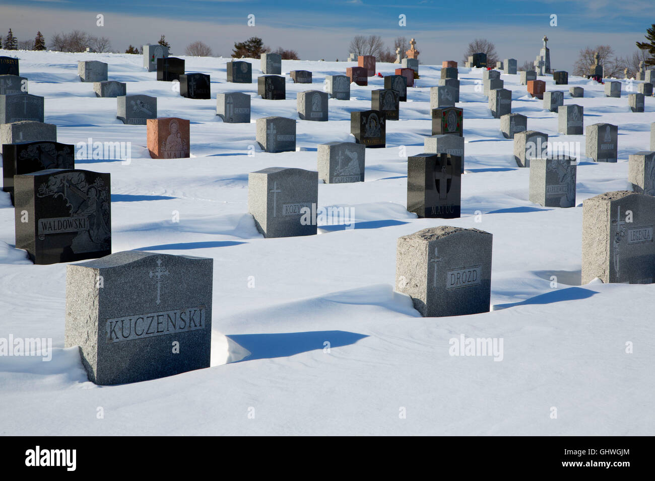 Headstones with snow, Sacred Heart Cemetery, New Britain , Connecticut