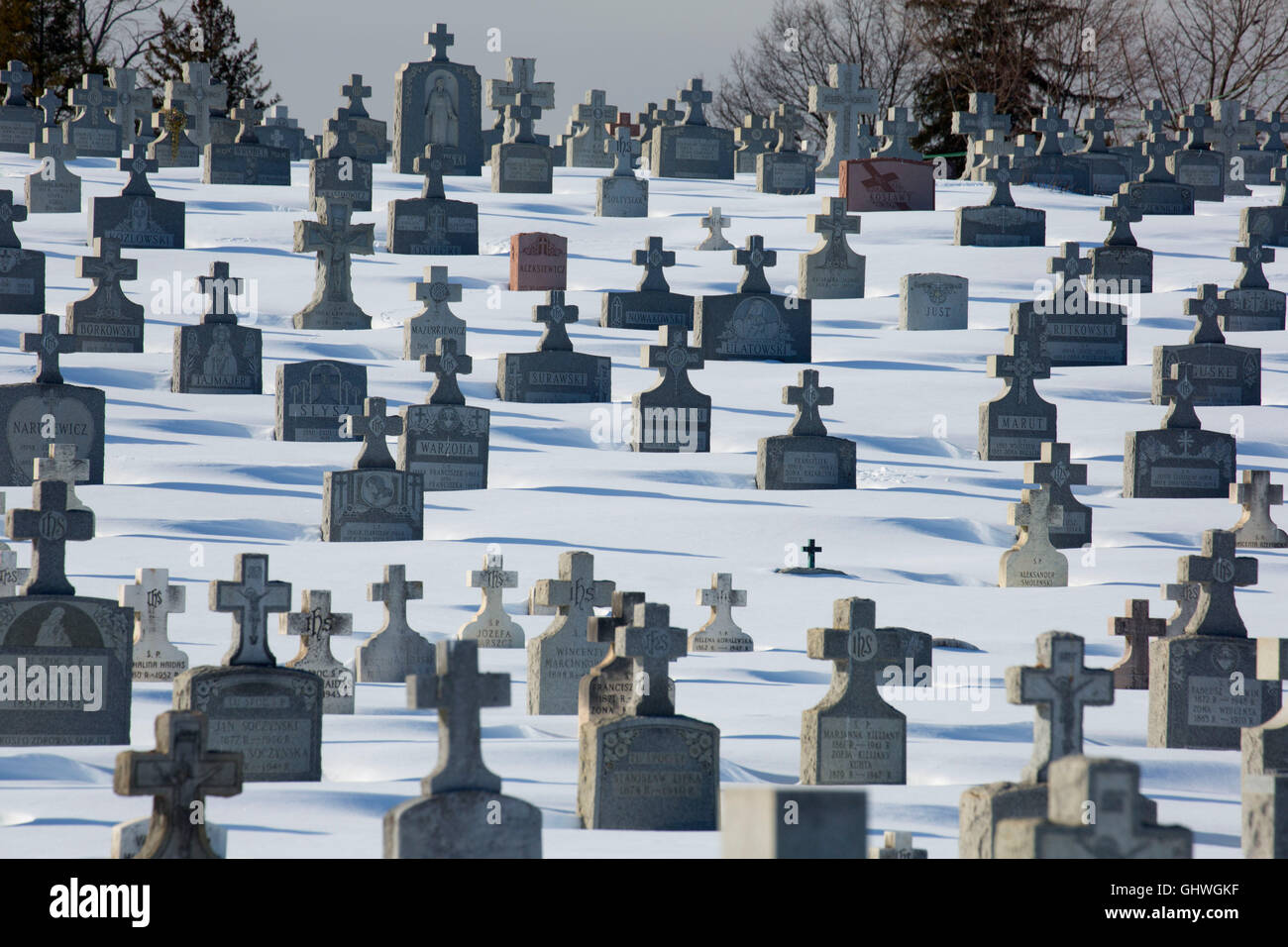Headstones with snow, Sacred Heart Cemetery, New Britain , Connecticut