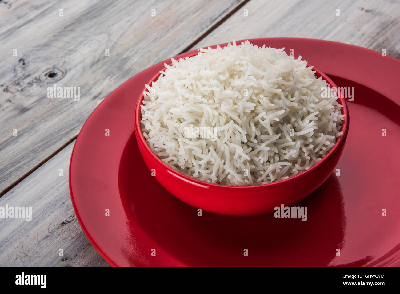 basmati rice in a brass bowl, cooked basmati rice, cooked plain rice