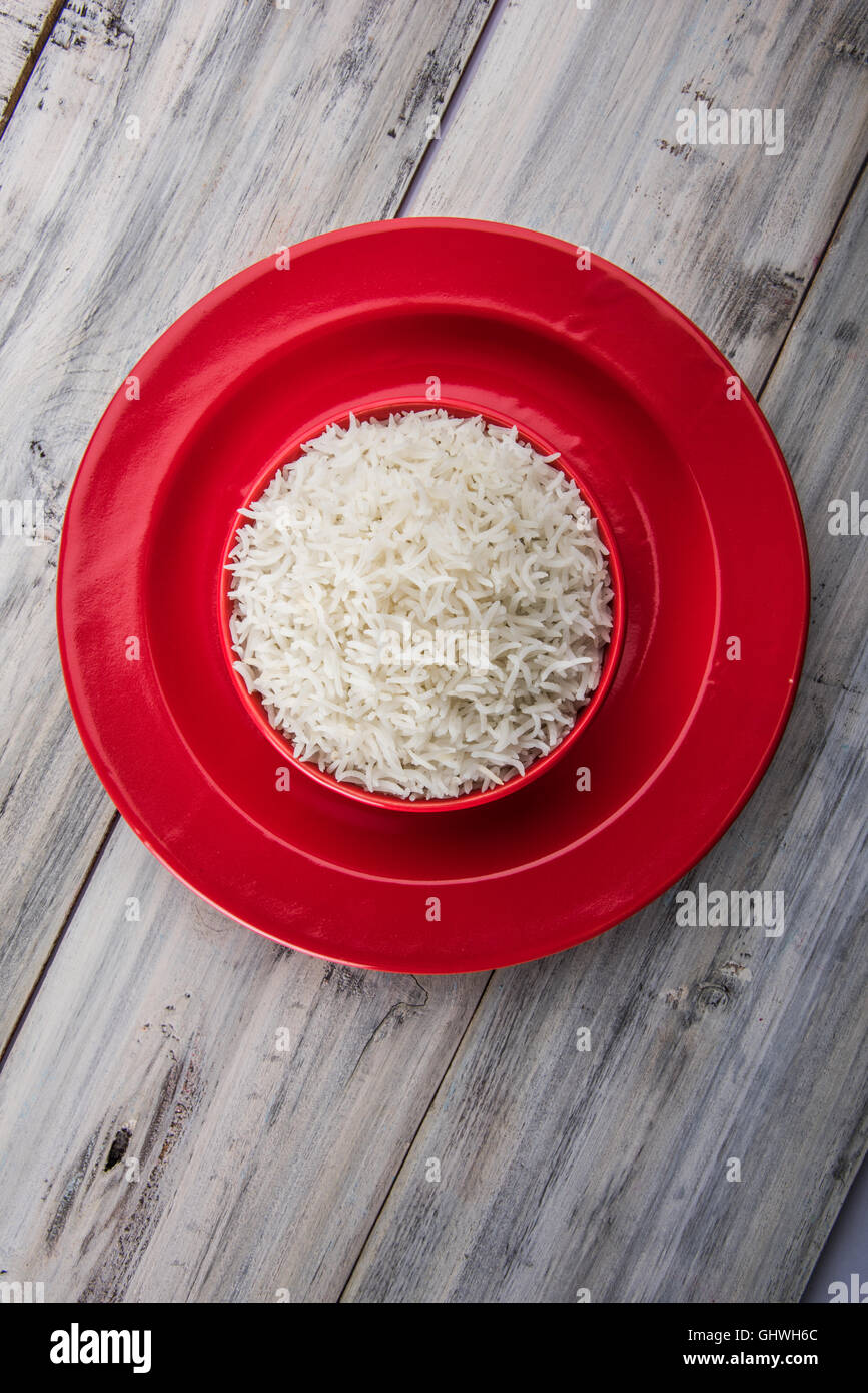 basmati rice in a brass bowl, cooked basmati rice, cooked plain rice