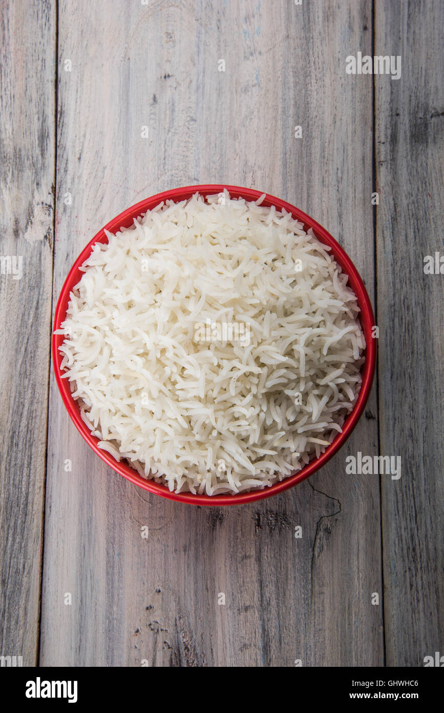 basmati rice in a brass bowl, cooked basmati rice, cooked plain rice