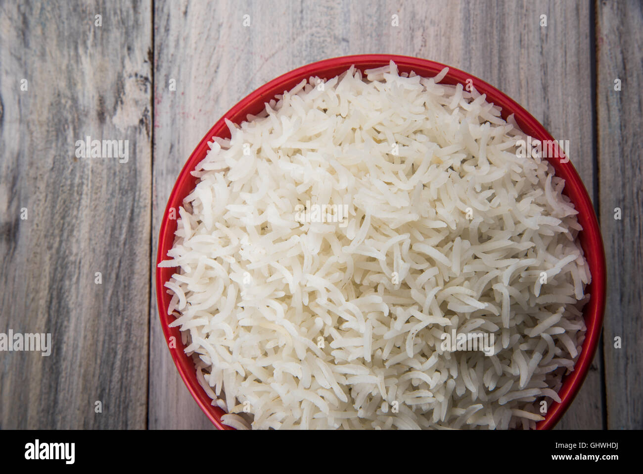 basmati rice in a brass bowl, cooked basmati rice, cooked plain rice