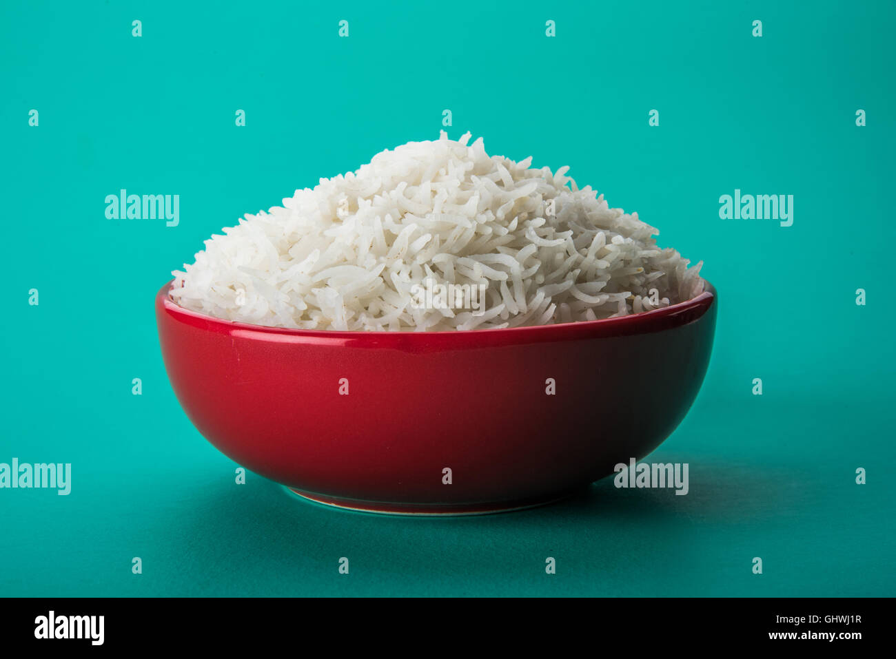 basmati rice in a brass bowl, cooked basmati rice, cooked plain rice, cooked white basmati rice