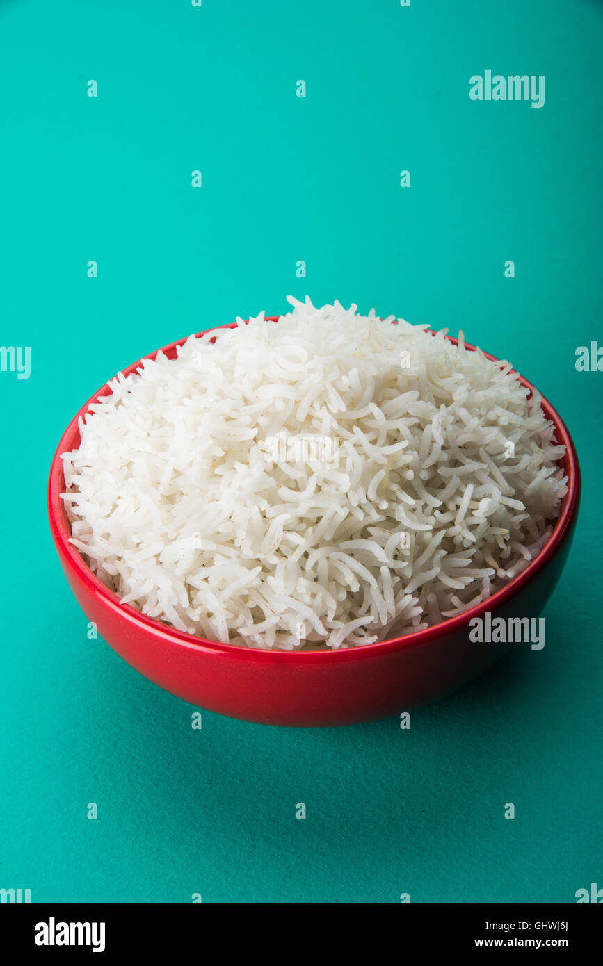 basmati rice in a brass bowl, cooked basmati rice, cooked plain rice