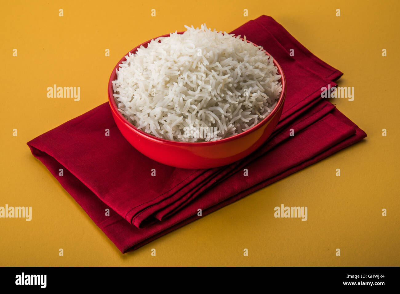 basmati rice in a brass bowl, cooked basmati rice, cooked plain rice